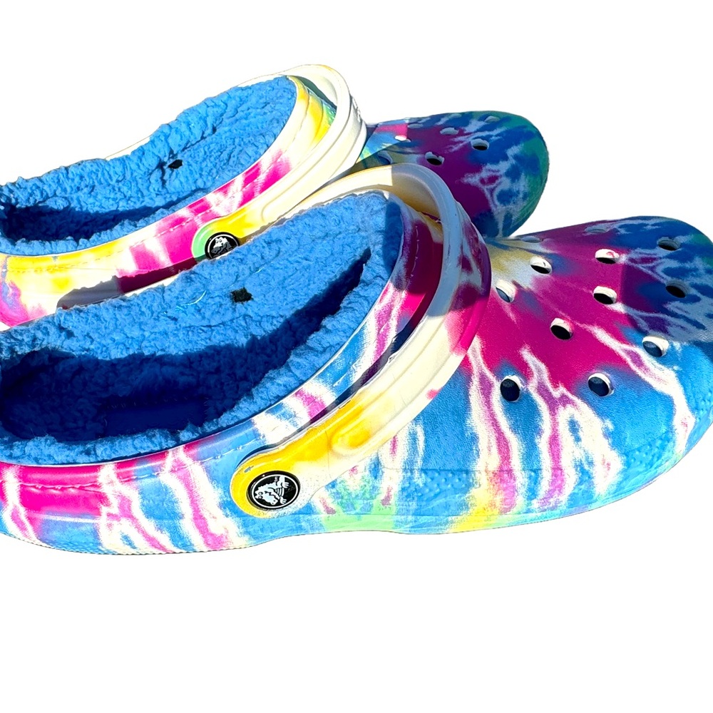Women’s sizes 11 tie-dye, super soft original Crocs.